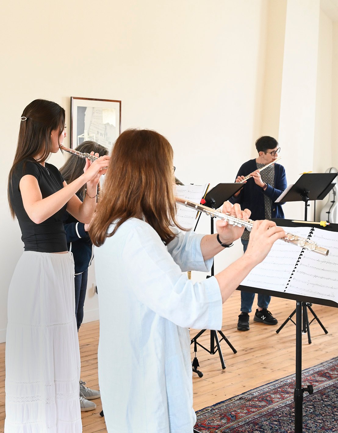Adult flutists playing chamber music on a flute course in France